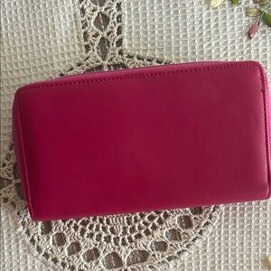 Vibrant Pink Wallet with Silver Zipper and Black Lining